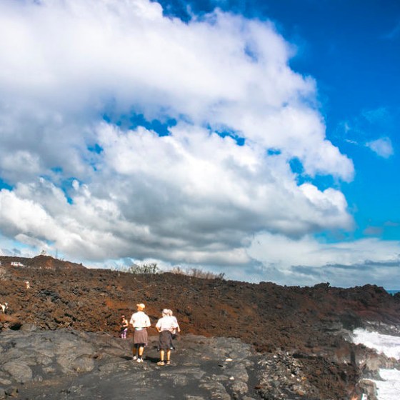 a man riding on top of a mountain