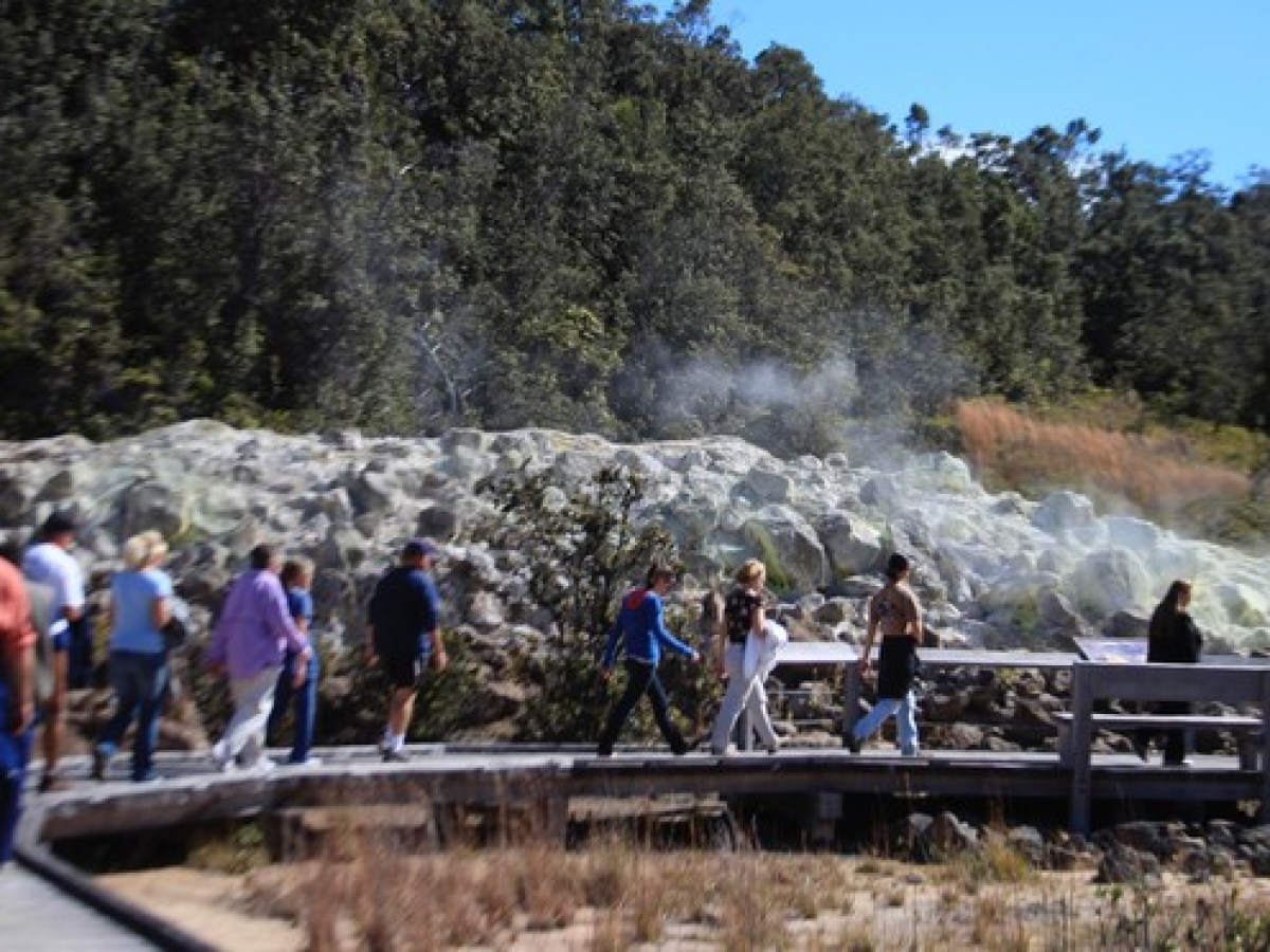 a group of people around a track